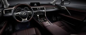 Vô-lăng và khu vực điều khiển trung tâm được bọc da và ốp gỗ cao cấp